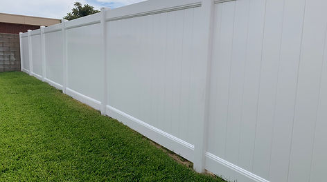White vinyl privacy fence installed by Alpha Fence Company